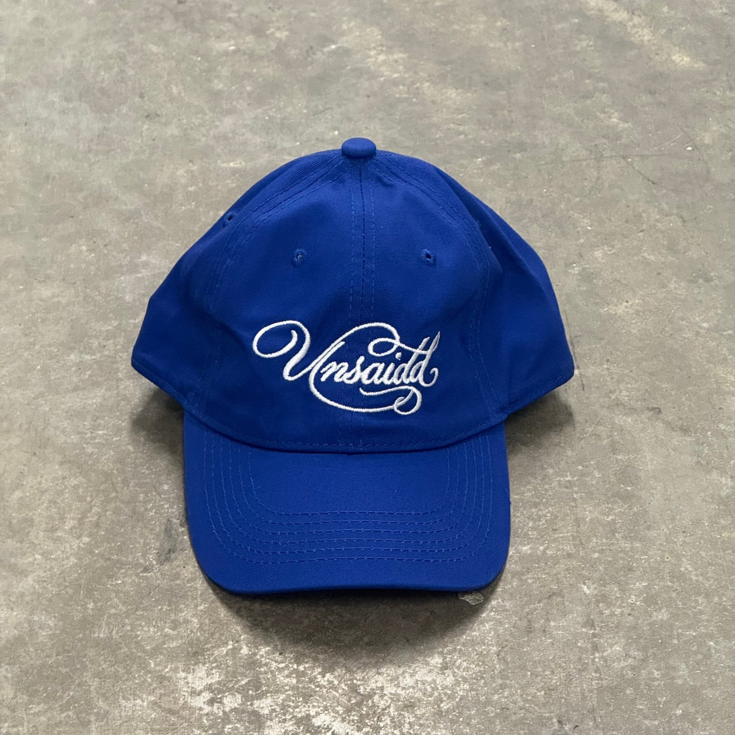 'UNSAIDD' Blue & White Script Hat